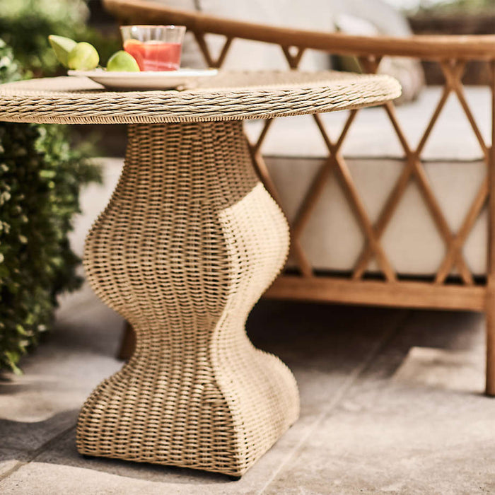 The Felix Wicker Outdoor Accent Table by Jake Arnold