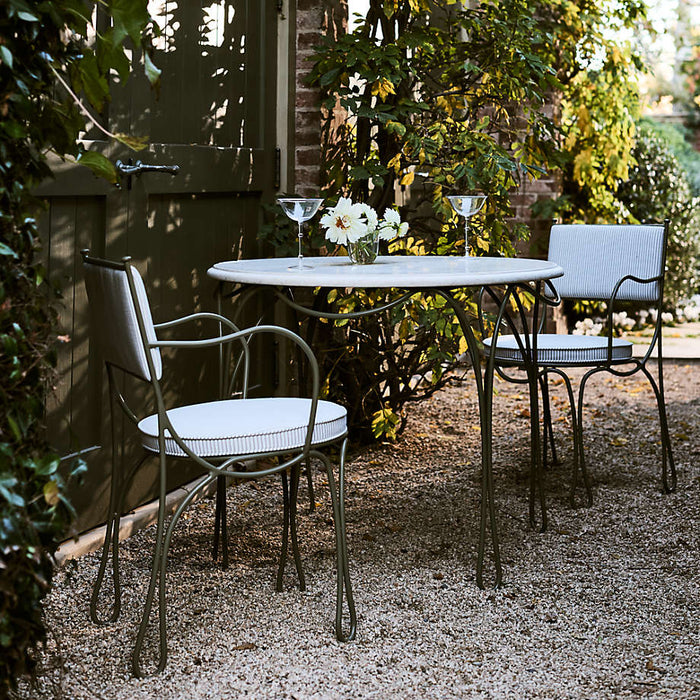 The Harpen Metal Outdoor Dining Arm Chair by Jake Arnold